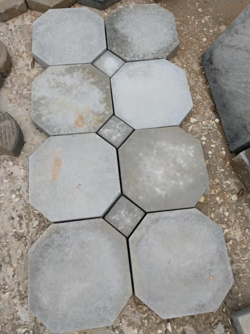 Octagonal pavers laid with small square infills