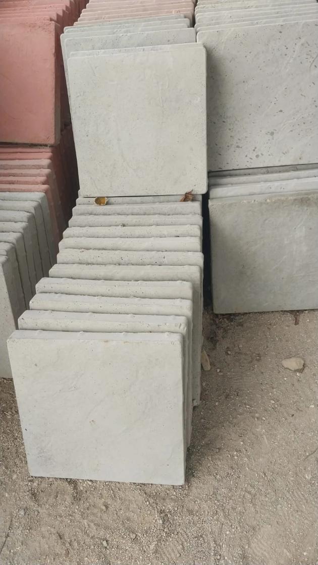 Stacked grey concrete slabs